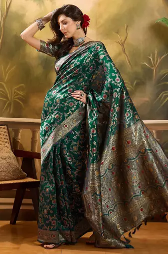 green banarasi jacquard saree with golden zari weaving & tassel pallu     unstitched blouse