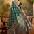green banarasi jacquard saree with golden zari weaving & tassel pallu     unstitched blouse