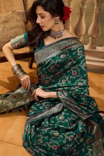green banarasi jacquard saree with golden zari weaving & tassel pallu     unstitched blouse