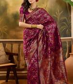 wine banarasi jacquard saree with golden zari weaving & tassel pallu     unstitched blouse