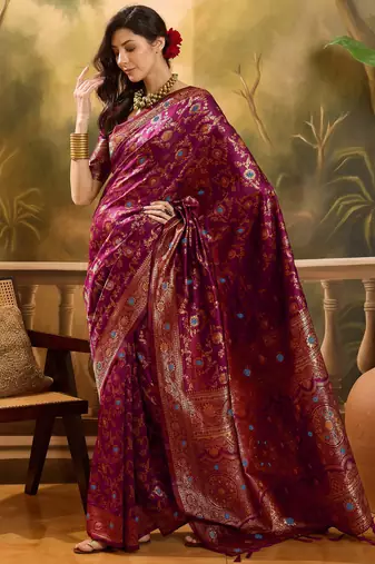 wine banarasi jacquard saree with golden zari weaving & tassel pallu     unstitched blouse