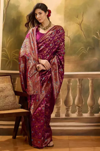 wine banarasi jacquard saree with golden zari weaving & tassel pallu     unstitched blouse