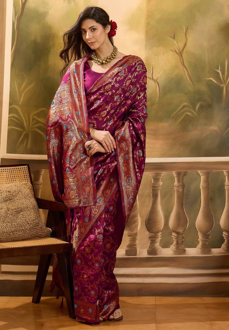 wine banarasi jacquard saree with golden zari weaving & tassel pallu     unstitched blouse