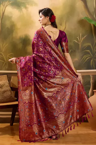 wine banarasi jacquard saree with golden zari weaving & tassel pallu     unstitched blouse