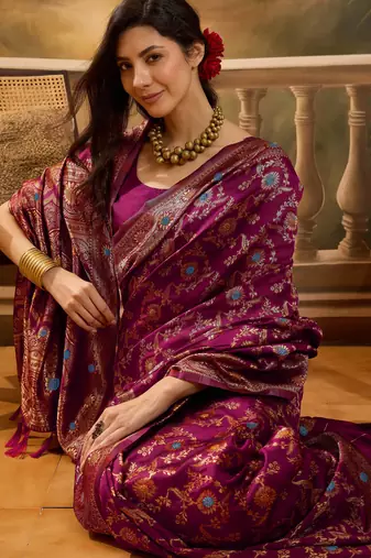 wine banarasi jacquard saree with golden zari weaving & tassel pallu     unstitched blouse