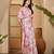 Baby pink linen silver zari saree with belt bold floral digital print & latkan tassel pallu