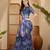 Royal blue linen silver zari saree with belt bloom print & tassel pallu