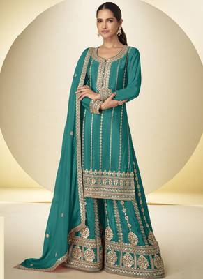 Turquoise embroidered chinon silk plazzo suit 1
