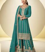Turquoise embroidered chinon silk plazzo suit