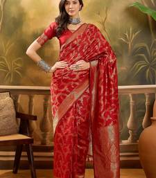 red banarasi jacquard saree with golden zari weaving & tassel pallu     unstitched blouse