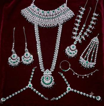 Green 2-layer bridal jewelry set with earrings, maang tikka, pasha, nath & panja | rhodium plated 2