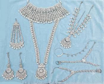 White 2-layer bridal jewelry set with earrings, maang tikka, pasha, nath & panja | rhodium plated 2