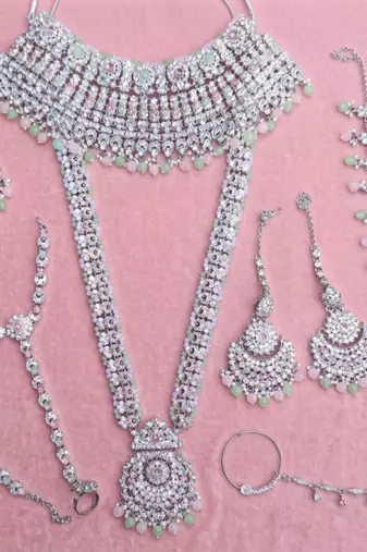 Pink pista 2-layer bridal jewelry set with earrings, maang tikka, pasha, nath & panja | rhodium plated