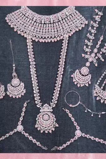 Baby pink 2-layer bridal jewelry set with earrings, maang tikka, pasha, nath & panja | rhodium plated