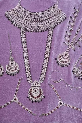 purple 2-layer bridal jewelry set with earrings, maang tikka, pasha, nath & panja   rhodium plated