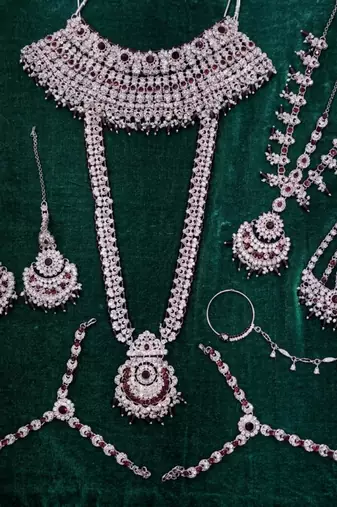maroon 2-layer bridal jewelry set with earrings, maang tikka, pasha, nath & panja   rhodium plated