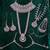 Maroon 2-layer bridal jewelry set with earrings, maang tikka, pasha, nath & panja | rhodium plated
