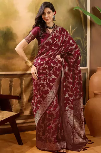 maroon banarasi jacquard saree with rich golden zari weaving & tassel pallu     unstitched blouse