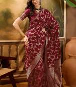 maroon banarasi jacquard saree with rich golden zari weaving & tassel pallu     unstitched blouse