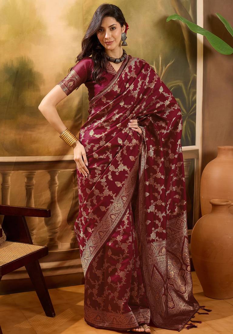 maroon banarasi jacquard saree with rich golden zari weaving & tassel pallu     unstitched blouse