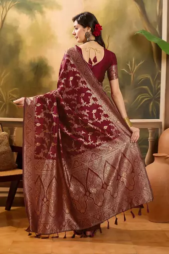 maroon banarasi jacquard saree with rich golden zari weaving & tassel pallu     unstitched blouse
