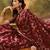 maroon banarasi jacquard saree with rich golden zari weaving & tassel pallu     unstitched blouse