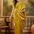 golden banarasi jacquard sari with elegant zari weaving & tassel detailed pallu     unstitched blouse