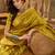 golden banarasi jacquard sari with elegant zari weaving & tassel detailed pallu     unstitched blouse