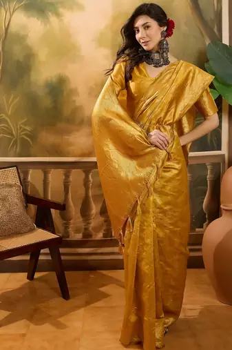 golden banarasi jacquard saree with rich zari weaving & tassel pallu     unstitched blouse