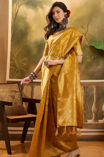 golden banarasi jacquard saree with rich zari weaving & tassel pallu     unstitched blouse