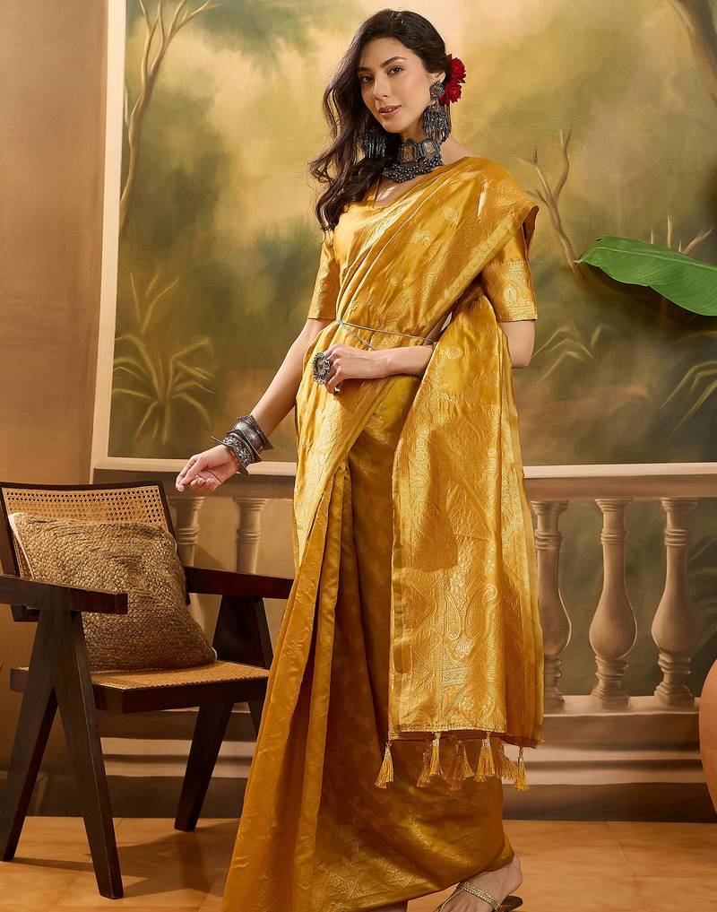 golden banarasi jacquard saree with rich zari weaving & tassel pallu     unstitched blouse