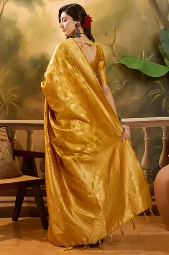 golden banarasi jacquard saree with rich zari weaving & tassel pallu     unstitched blouse