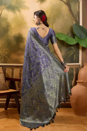 lavender banarasi jacquard saree with elegant zari weaving & tassel pallu     unstitched blouse