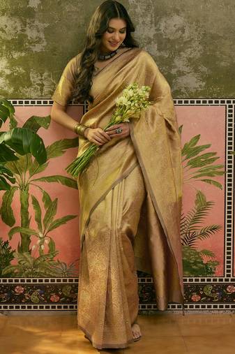 beige woven design saree with subtle border