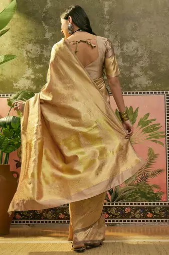 beige woven design saree with subtle border