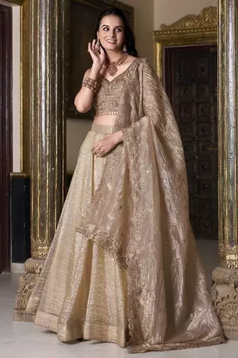 Beige sequins and thread embroidered gold rush fabric lehenga choli dupatta