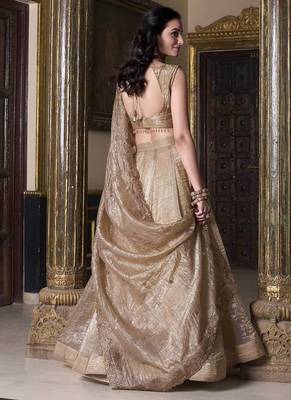 Beige sequins and thread embroidered gold rush fabric lehenga choli dupatta 5