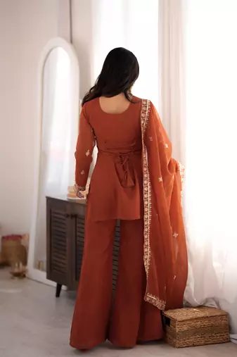 Orange crunchy silk blend embroidered kurta set with bell bottom & dupatta