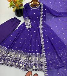 Dark blue heavily embroidered anarkali suit set
