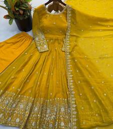 Yellow heavily embroidered anarkali suit set