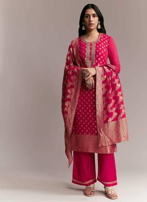 Women's rani pink banarasi woven kurta palazzo set with heavy jacquard dupatta for festival & wedding wear 1