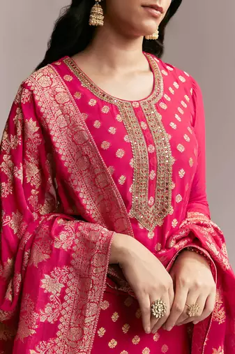 Women's rani pink banarasi woven kurta palazzo set with heavy jacquard dupatta for festival & wedding wear