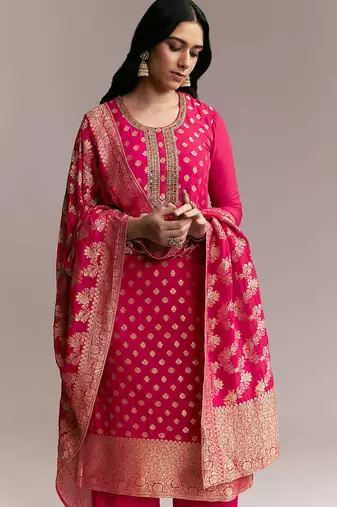 Women's rani pink banarasi woven kurta palazzo set with heavy jacquard dupatta for festival & wedding wear