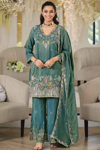 Turquoise embroidered roman silk salwar suit