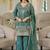 Turquoise embroidered roman silk salwar suit