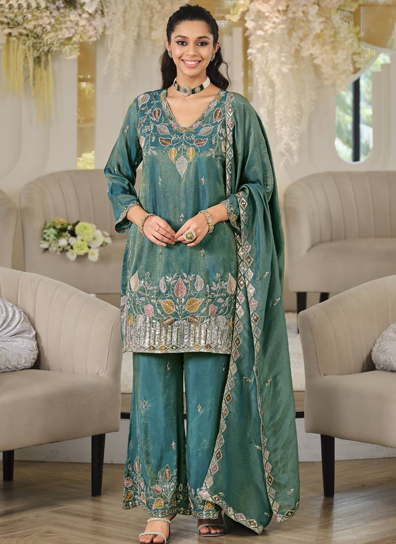 Turquoise embroidered roman silk salwar suit