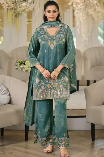 Turquoise embroidered roman silk salwar suit