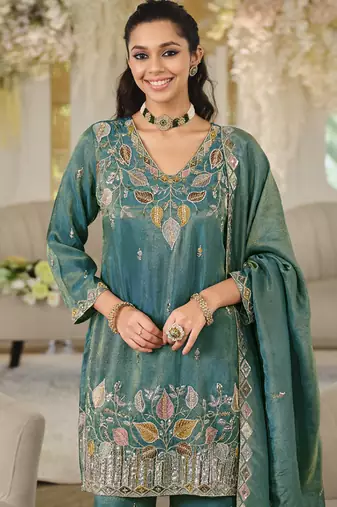 Turquoise embroidered roman silk salwar suit