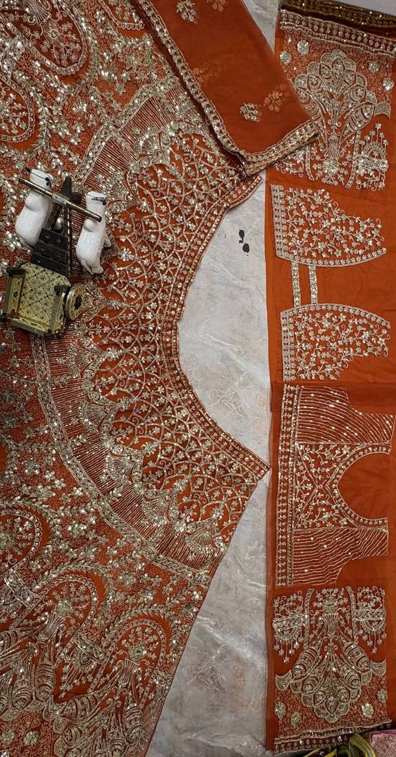 Orange color Embroidery Sequins Work Net Lehenga Choli set  