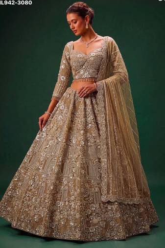 Beige Net Heavily Embroidered Royal Bridal Reception Lehenga Choli Set